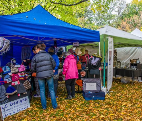 people attending a Crafts fair in autumn